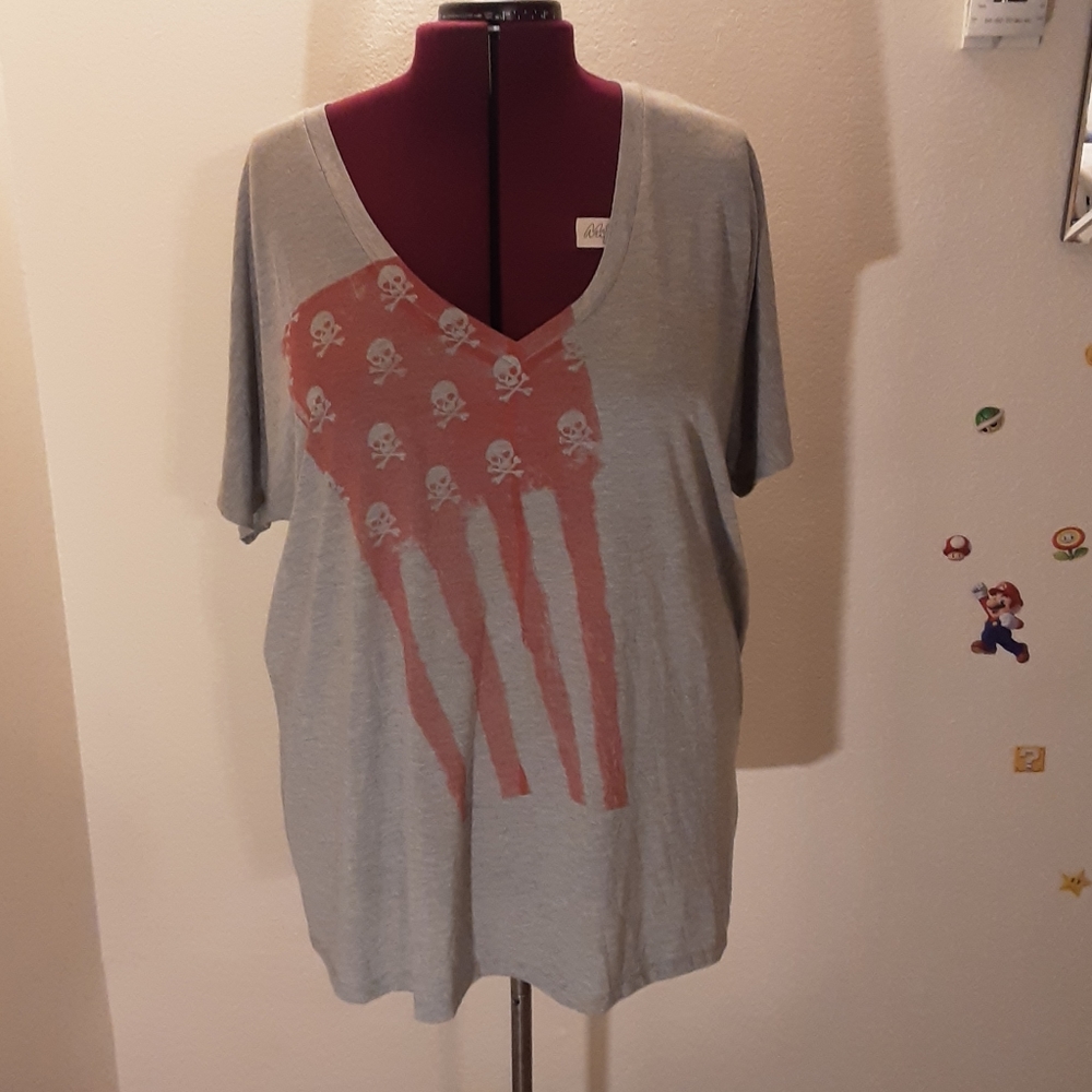 Torrid skull flag t shirt.
